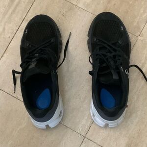 On Running women’s 10.5/men’s 9 Black and White Athletic Shoes